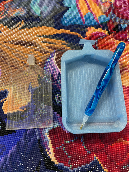 Blue Deluxe 2 Phoenix Medium Diamond Painting Tray with pen on colorful canvas background.